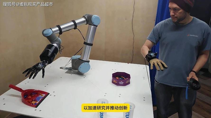 工人在触觉反馈手套示教协作机器人精密装配插接件
